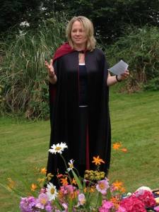 Shea offering a reading in a ceremony on the Wild Magick of Wales Pilgrimage