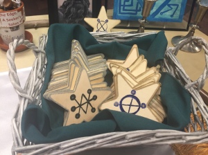 Saturn (let) and Jupiter (right), two sided tokens with Saturn on one side and Jupiter on the other, handcrafted by Alinore with vision by Temple HPS Shea Morgan, for our Spirit's Edge Shamonial Temple Yule / Winter Solstice Ritual, Dec. 17, 2016