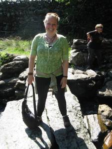 Straddling the waters of Merlin's Pool at the base of Dinas Emrys.