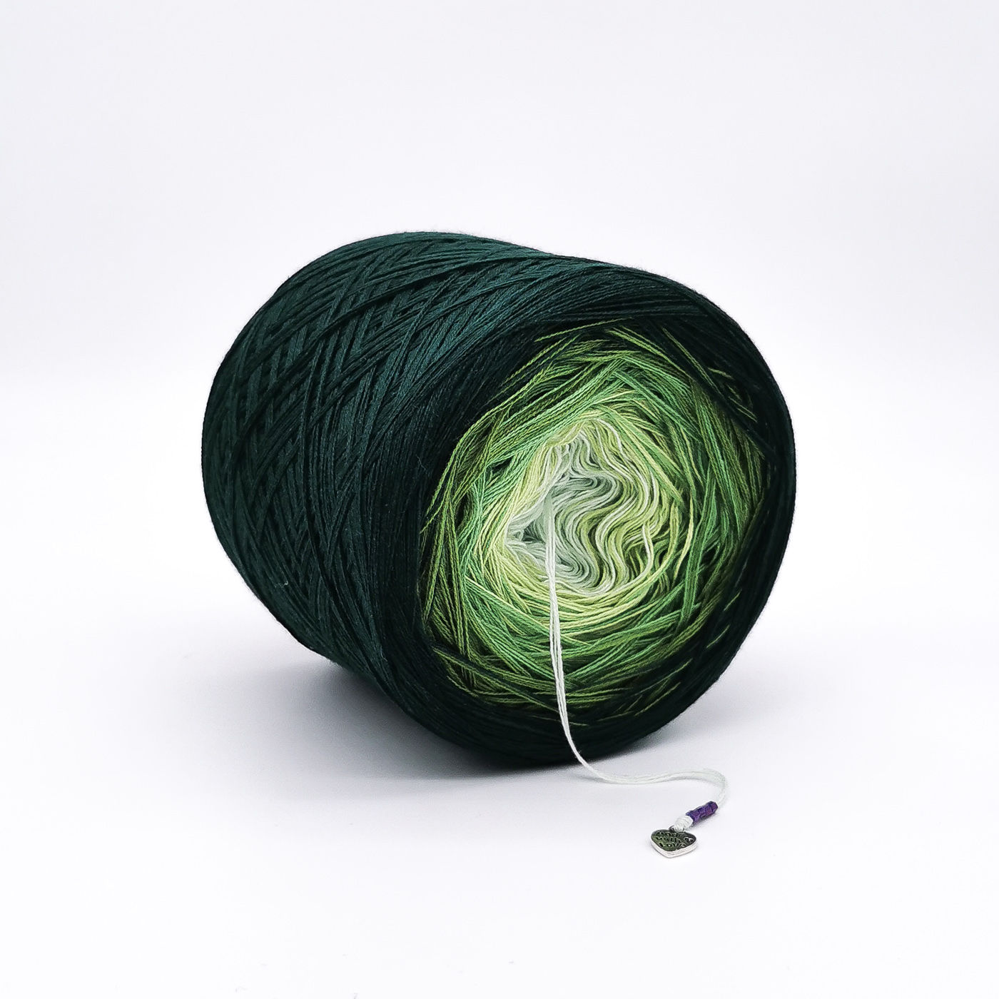 dark green to light green ombre yarn cake