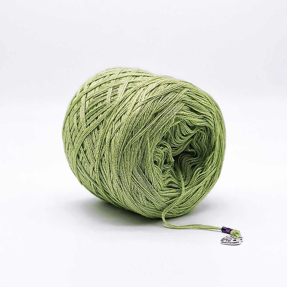 Light green coloured yarn cake