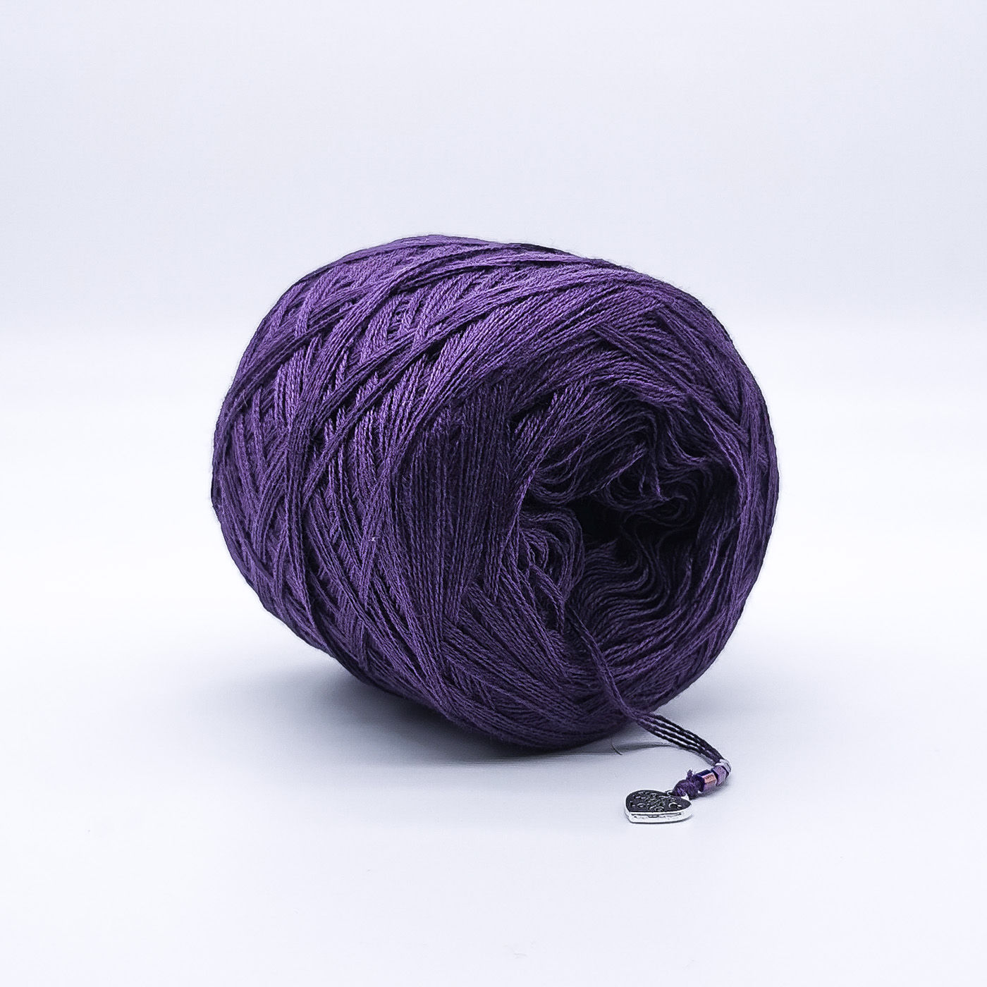 Purple coloured yarn cake