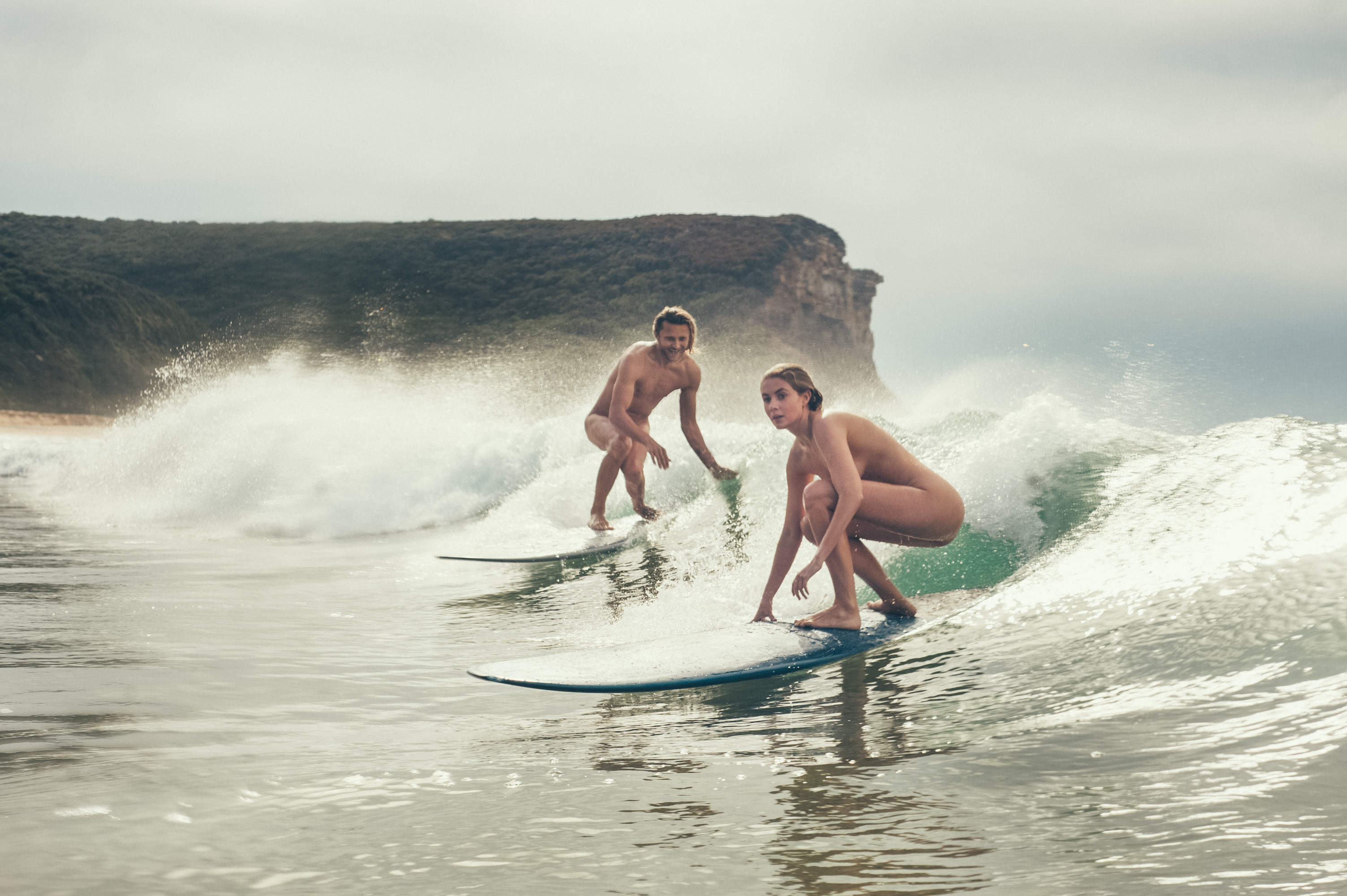 Topless Surfer Girl