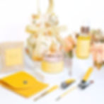 Hand care gift set with cuticle oil for nails and a manicure set in a luxury yellow floral canvas pouch