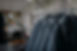 row-of-jackets-on-hangers-clothing-store-fabric-2021-08-26-16-26-03-utc_edited_edited.jpg