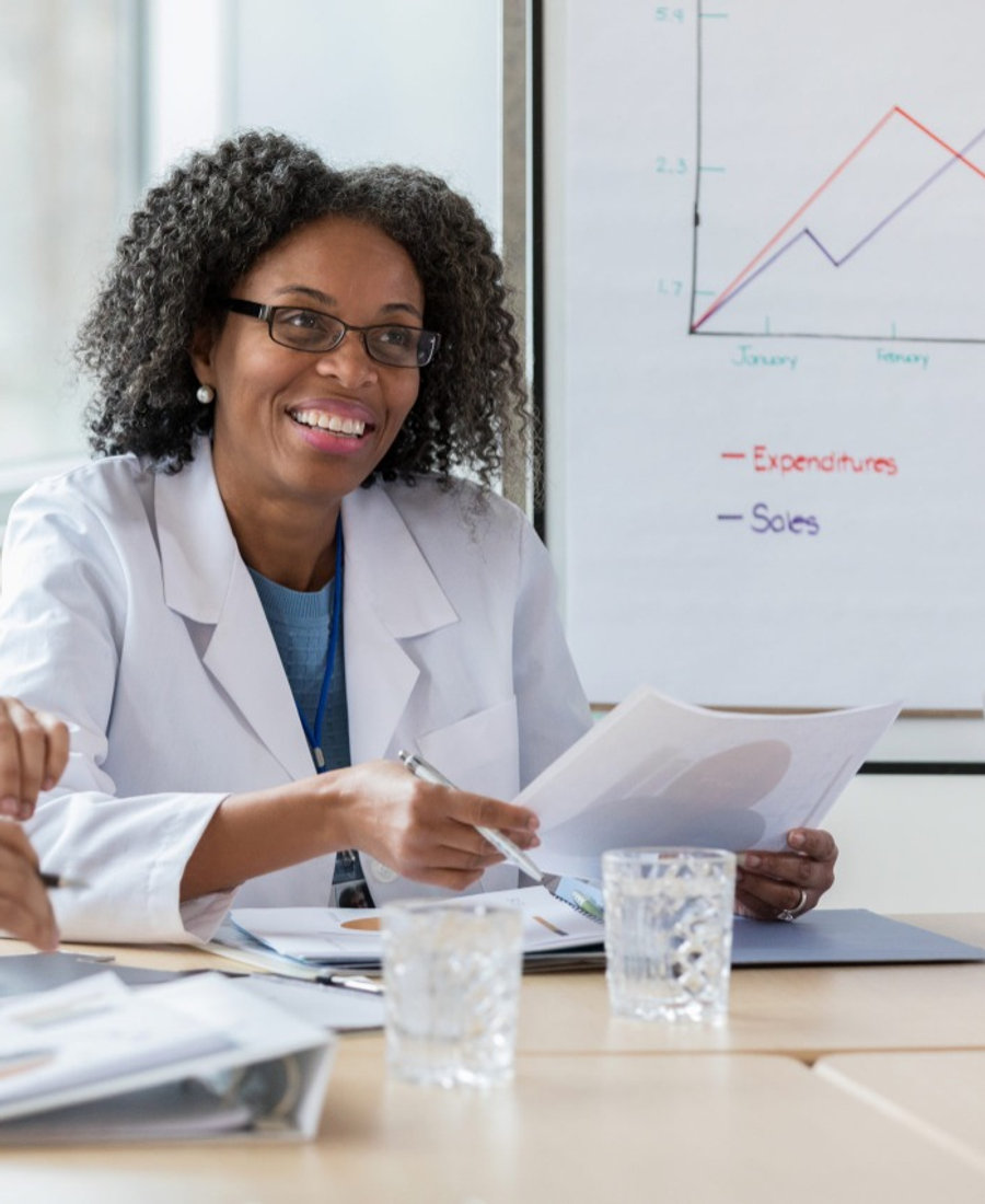Healthcare professional reviewing equipment
