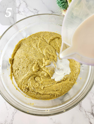 Adjust the mixer to low speed, and gradually add the dry ingredients mixture to the wet ingredients, alternating with the buttermilk, beginning and ending with the dry ingredients. Mix until just combined.