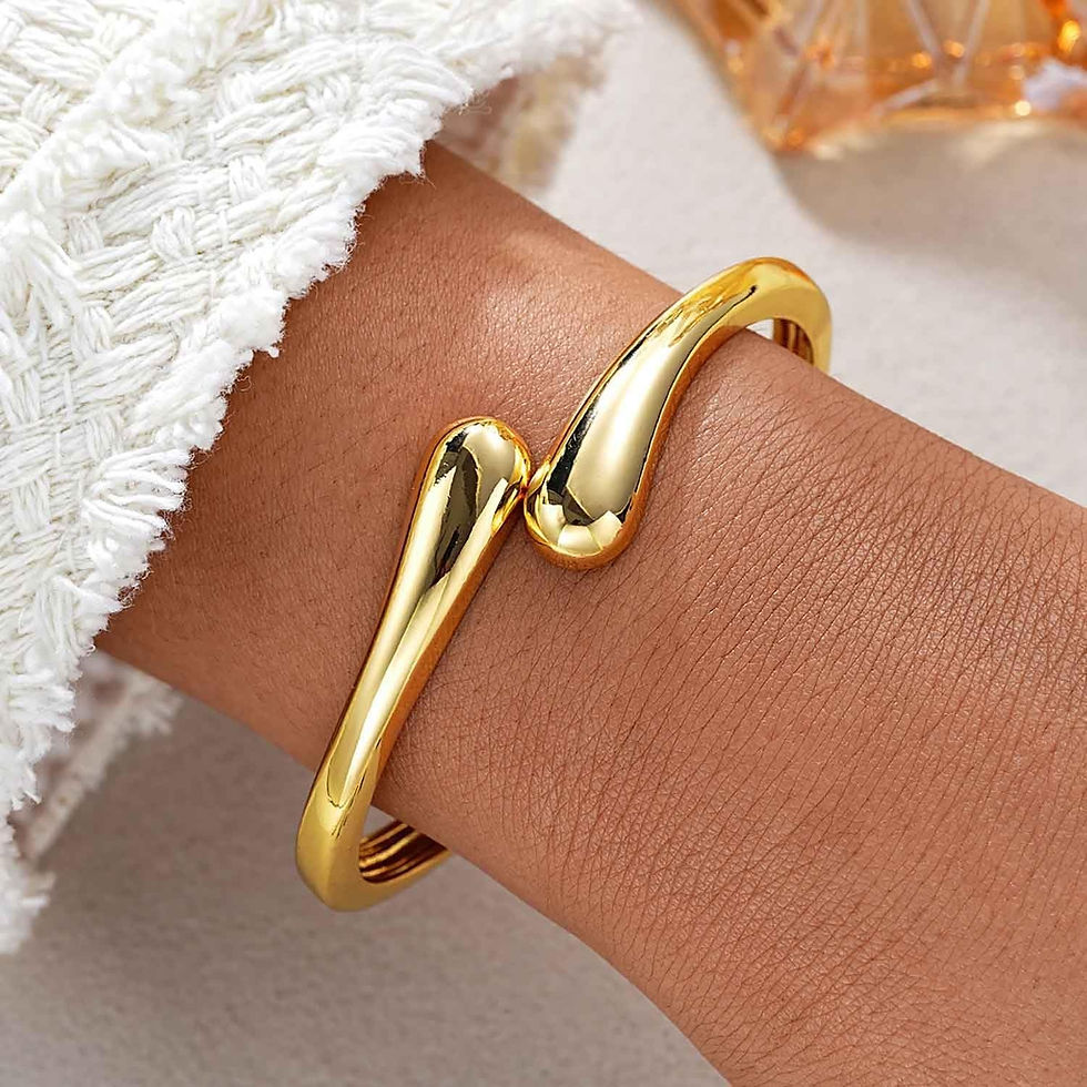 Thumbnail: Solenne Fluid Gold Bangle