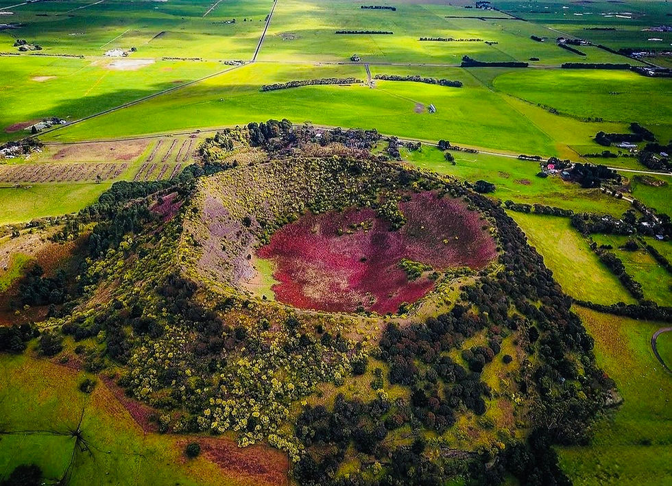 Wide-angle view of Mount Schank crater and surrounding farmland near the Bellum Hotel.