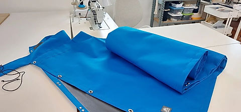 boom cover and sunbrella sail covers being sewn in our portland studio