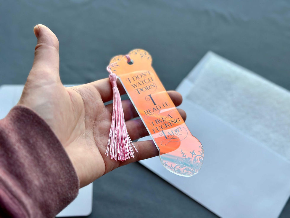 Thumbnail: Hand holding a bookmark that reads 
