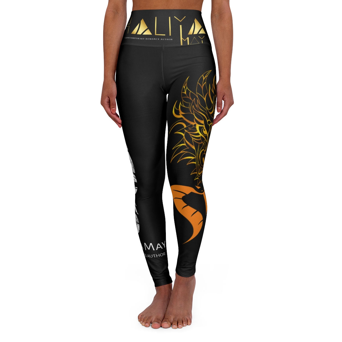 Black leggings with ALIIA text and orange design, woman wearing them.