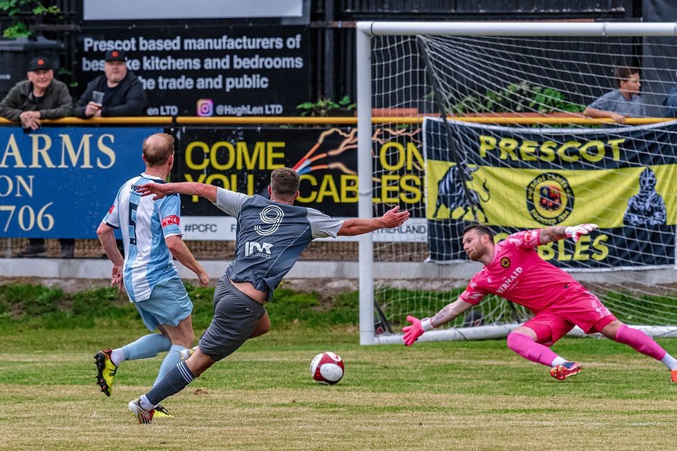 Elliot Taylor fires home against Prescot Cables