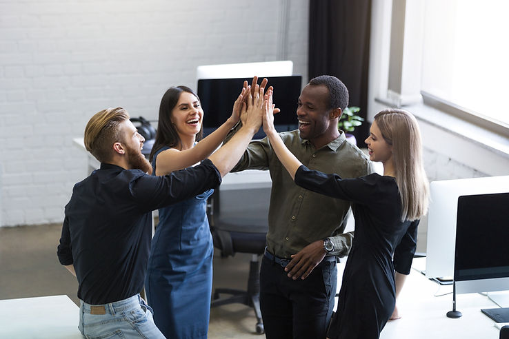 group-young-colleagues-giving-each-other-high-five.jpg