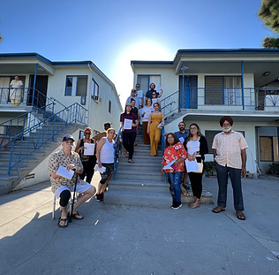 Healing & Justice Center Tenant Counseling Hotling Group Standing on stairs