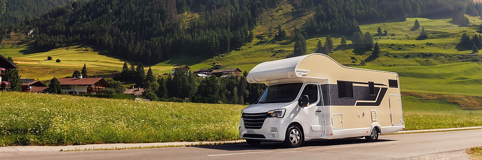 Scenic view big modern white family rv camper van vehicle drive Europe highway road alpine