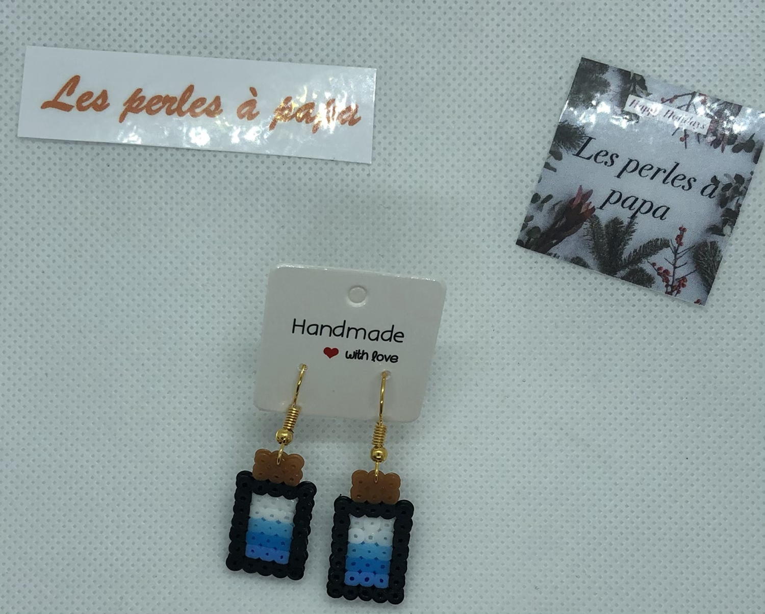 Boucle d’oreille Fiole