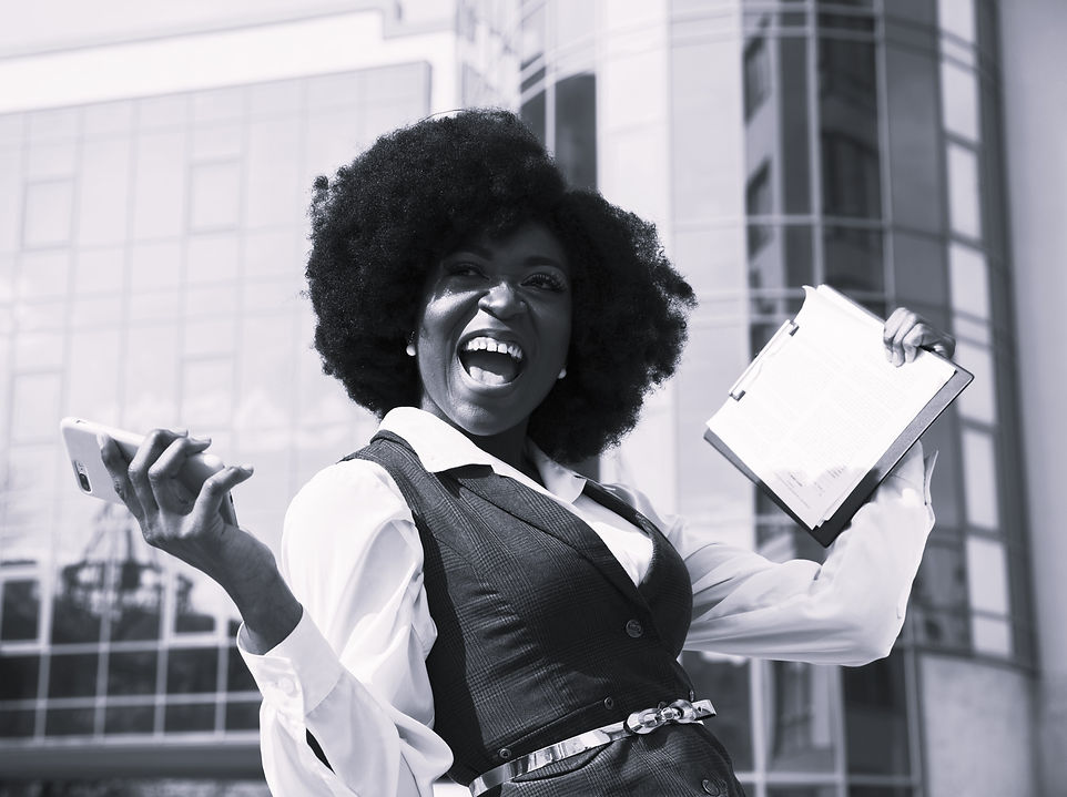 excited-young-african-businesswoman-holding-mobile-phone-clipboard.jpg