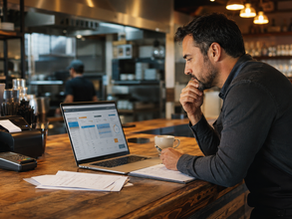 Small business owner reviewing a merchant cash advance offer — understanding factor rates and holdback terms - DirectLend.ai