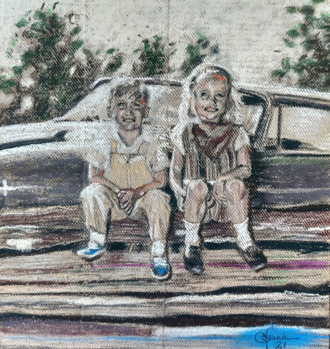 Two children on a fence