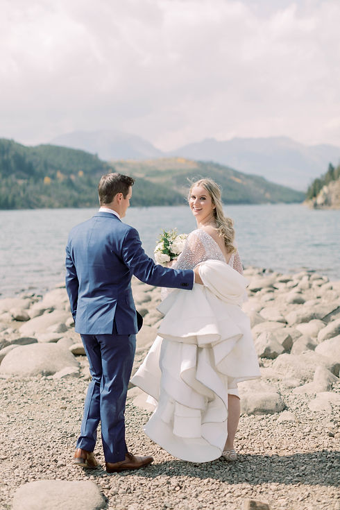 Florboxoxo Lake Dillon Breckenridge floral design for weddings bridal bouquet white flowers greenery outdoor lake wedding