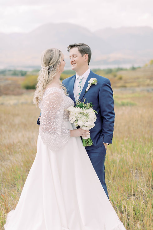 Florboxoxo Lake Dillon Breckenridge floral design for weddings bridal bouquet groom boutonniere white flowers greenery