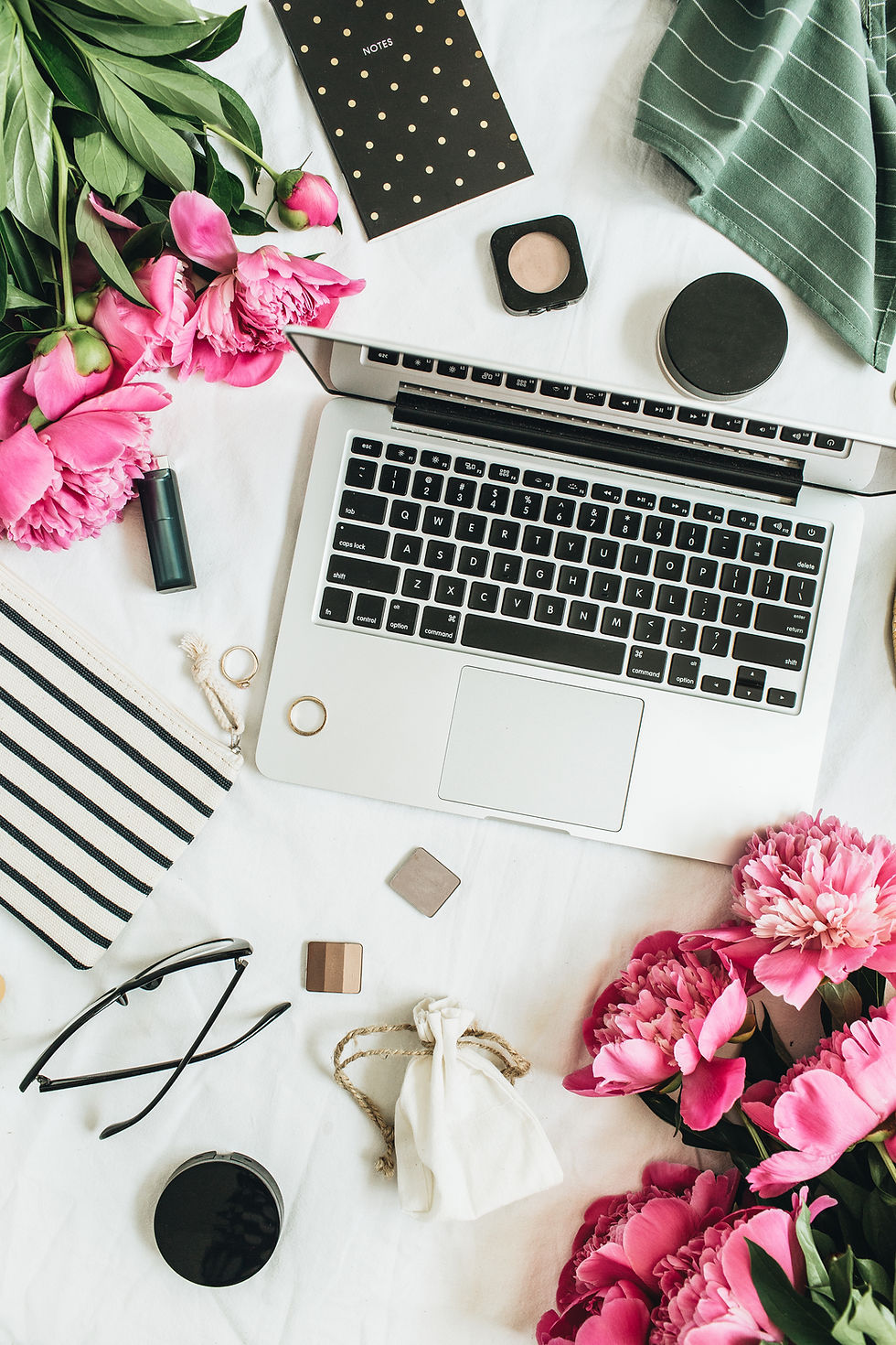 Home-office-flowers-pink-peonies-laptop-flatlay