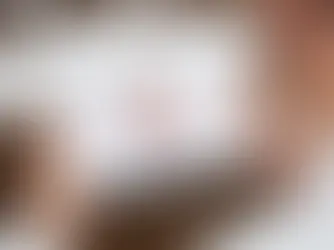 Image of someone holding a tablet looking at a doctor on camera.