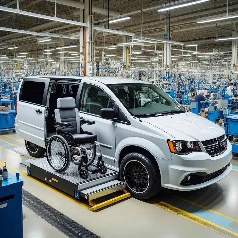 White minivan with wheelchair lift extended in a factory setting. Numerous machines are in the background. Bright lighting highlights details.
