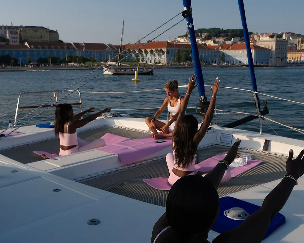 Pilates class aboard a private catamaran on the Tagus River in Lisbon