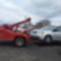 A Rio's Extraction Services and Repairs tow truck in action, ready to assist with any towing needs in South Bend, Indiana. Offering reliable, affordable, and professional towing service when you need it most.