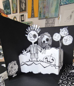 Structure en relief, petit garçon affolé et Camille. Papier blanc dessin noir