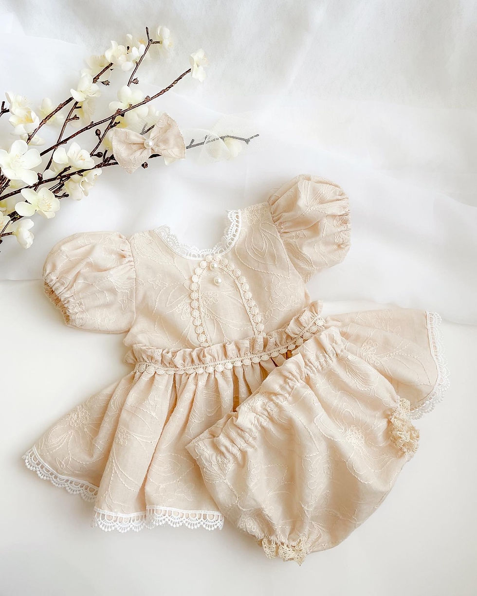 Newborn vintage outfit with a matching bloomer and headband