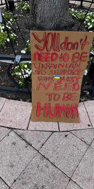 Sign at the Stand with Ukraine rally in West Palm Beach.