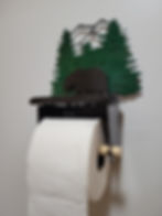 Bear Toilet Paper Holder is the perfect addition to any bathroom. Crafted from 14 gauge steel and a wooden dowel for a rustic