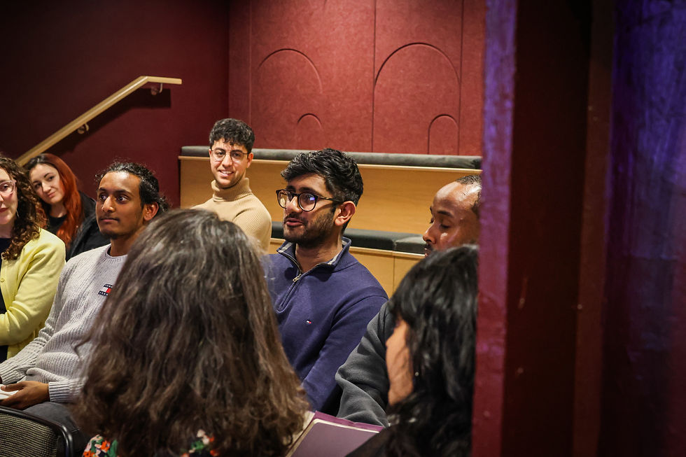 Close-up of colourful sticky notes on a whiteboard representing diverse ideas