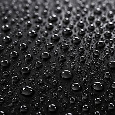 Water beading on a surface after spray ceramic sealant.