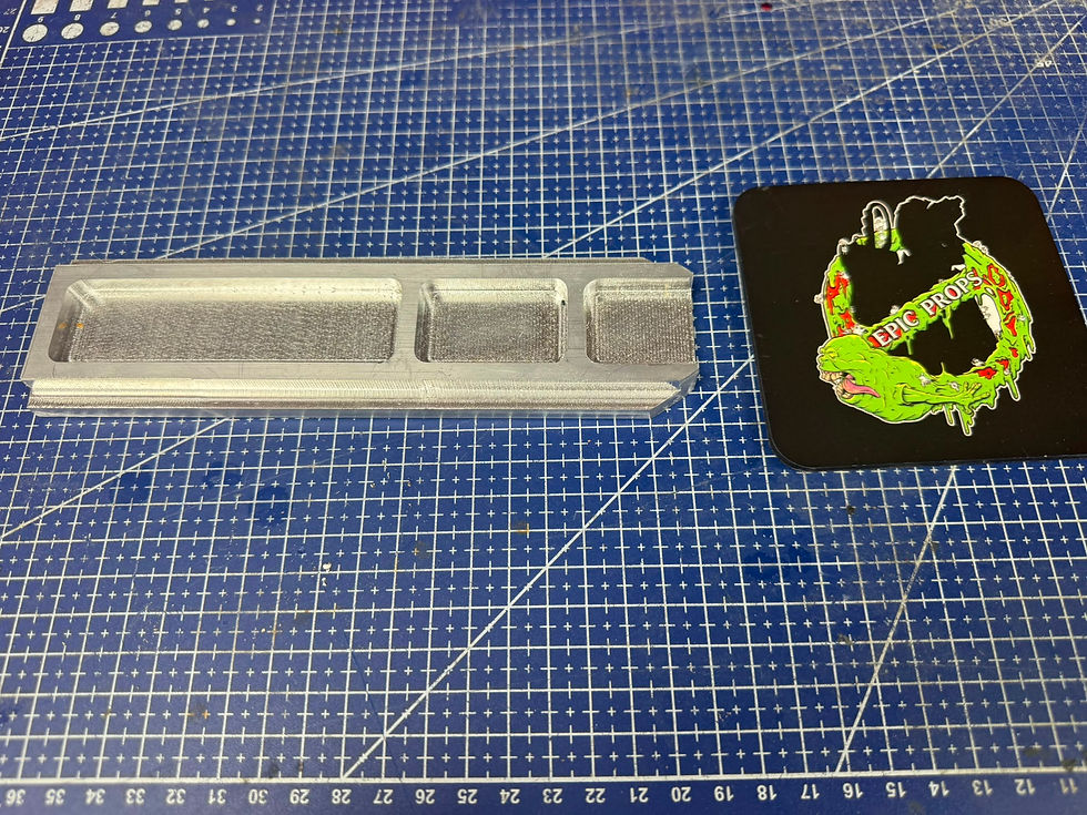 Machined aluminium gun track for a Ghostbusters Neutrona Wand
