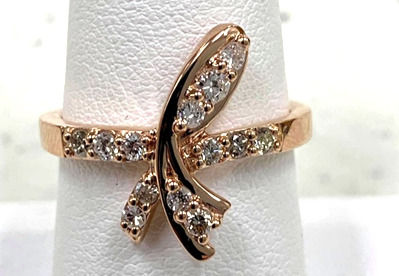 Freeform rose gold ring with 13 diamonds custom designed by Williamsburg Jewelers