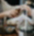 Feminine hands using a One Drop Refillery reusable, amber glass bottle at a refill station