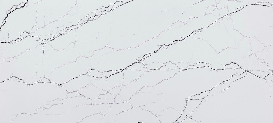white quartz countertop with purple lines