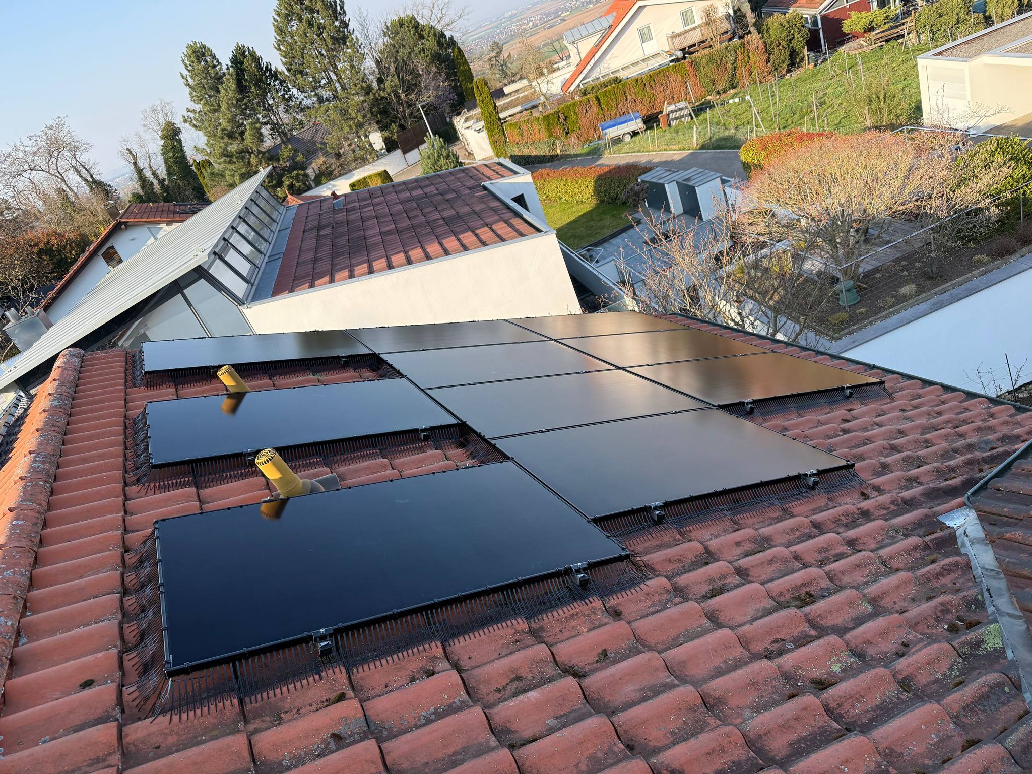 Wide aerial pass during a drone inspection solar panels flight over a rooftop array — PV Protector®