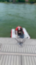 Thumbnail: Pup plank next to the Paradise Pad. Inflatable dog water ramp makes swimming easy for pup dog.