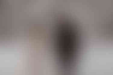 Bride and groom reading vows on their snowmobile elopement day