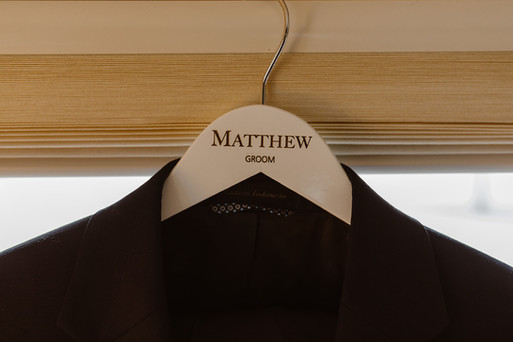 Groom hanger with his name on
