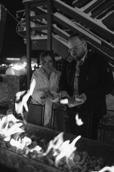 Bride and groom warming up at Brickhouse 737 in Ouray Colorado after their snowmobile elopement