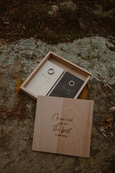 Bride and groom wooden vow box and rings
