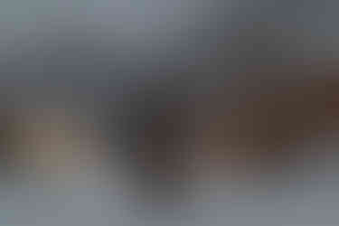 Bride and groom walking around Ouray Colorado, exploring and having a first dance on their snowmobile elopement day in Ouray Colorado