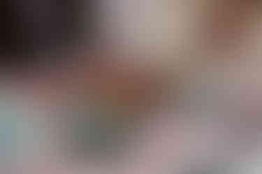 Bride and groom enjoying a picnic in the snow on their snowmobile elopement