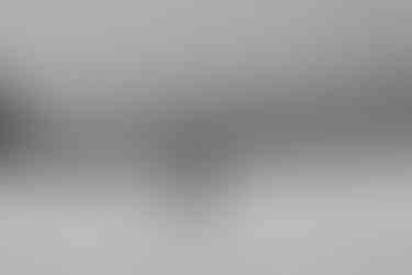 Wedding portraits during a snowstorm in Ouray Colorado on a snowmobile elopement